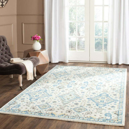 SAFAVIEH Evoke Stamen Traditional Bordered Area Rug, Ivory/Light Blue, 9' x 12'